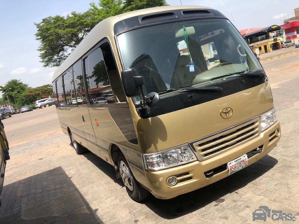 Commercial Coaster bus — Side profile