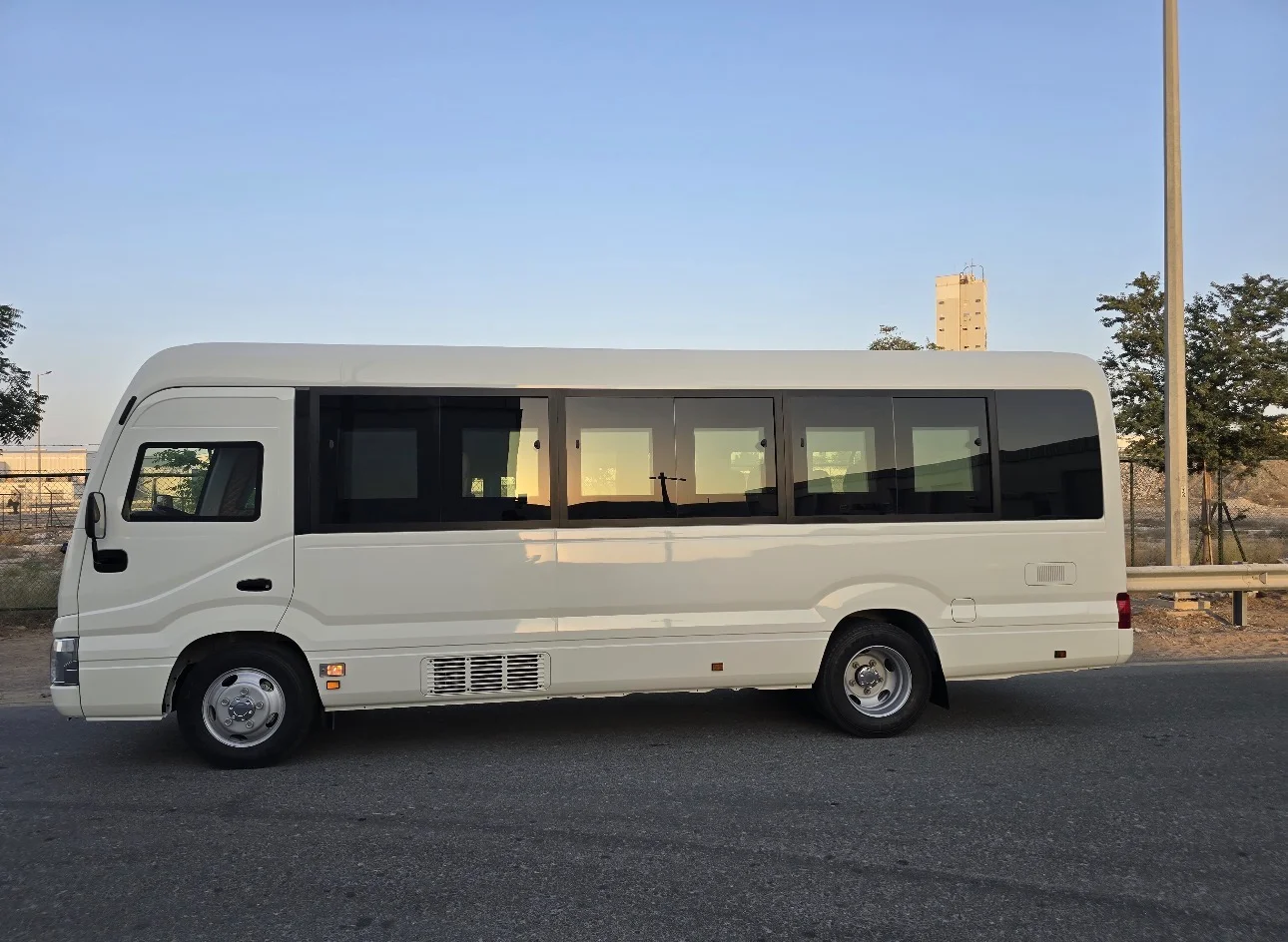 2025 Toyota Coaster bus Bus — Front seats